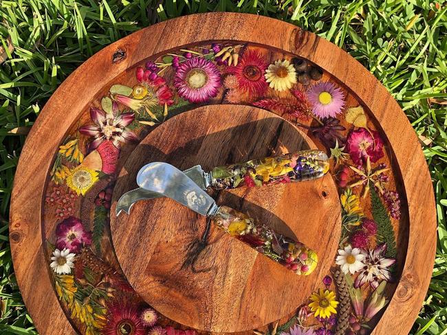 Bikay Michell makes these stunning native timber and wildflower boards from her Gladstone based business Indi & Soak.