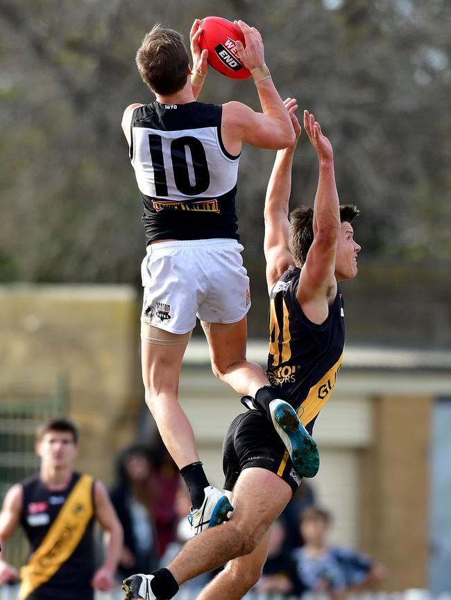 Reynolds takes a big grab for Port Adelaide against Glenelg in 2016. Picture: Mark Brake