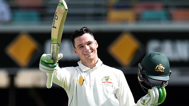 Peter Handscomb celebrates his maiden Test century. Picture: AAP