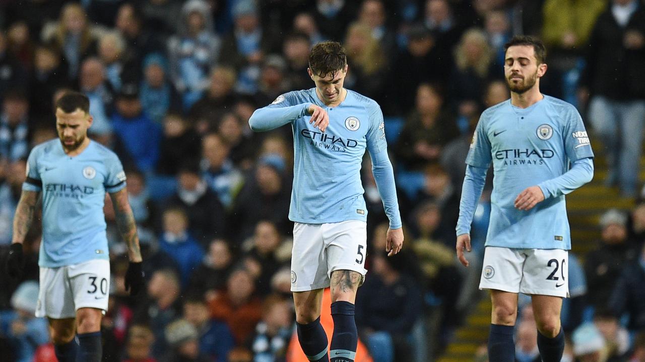 Manchester City defender John Stones (C) was accused of spying on his former partner.