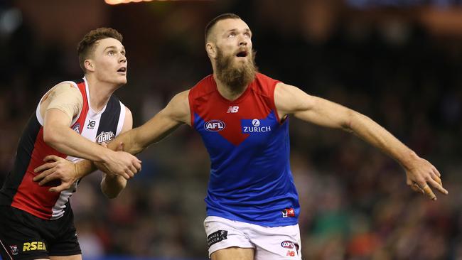 AFL Round 19. 27/07/2019. St Kilda v Melbourne at Marvel Stadium. Melbourne's Max Gawn holds out Blake Acres of the Saints. Pic: Michael Klein