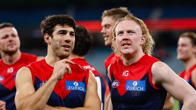 MELBOURNE, AUSTRALIA - APRIL 29: Clayton Oliver and Christian Petracca of the Demons are seen during the 2023 AFL Round 07 match between the Melbourne Demons and the North Melbourne Kangaroos at the Melbourne Cricket Ground on April 29, 2023 in Melbourne, Australia. (Photo by Dylan Burns/AFL Photos via Getty Images)