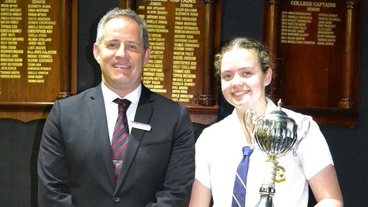 St Mary's College principal Stephan le Roux with the school's dux Molly Clarke.