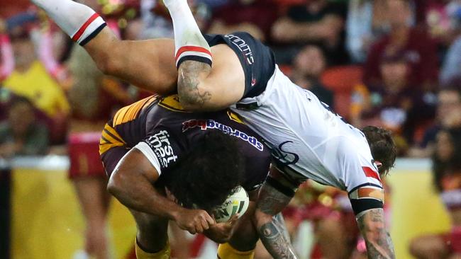 Sam Thaiday is stopped by the Roosters. Picture: Darren England.