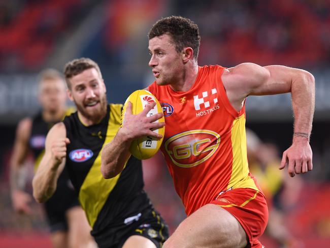 Suns player Pearce Hanley during the round 19 AFL match between the Gold Coast Suns and the Richmond Tigers at Metricon Stadium on the Gold Coast, Saturday, July 29, 2017.  (AAP Image/Dave Hunt) NO ARCHIVING, EDITORIAL USE ONLY