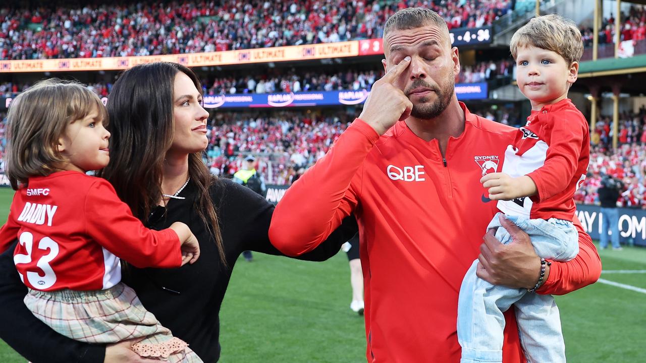 Lance Franklin farewells the crowd with his wife Jesinta Franklin and children during a lap of honour. Picture: Matt King