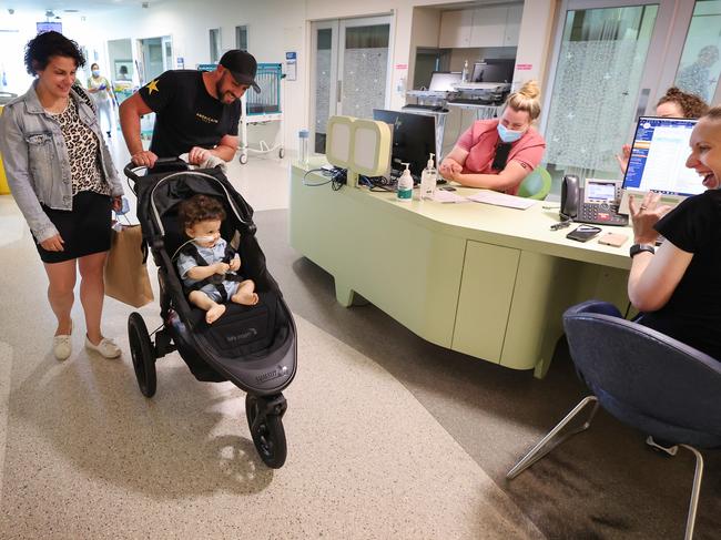 Harlen gets lots of goodbyes from nursing staff as he leaves the hospital. Picture: David Caird