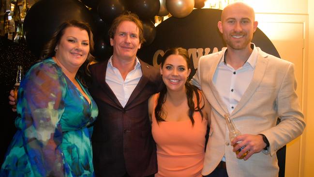 Kirsten Woodall, Matt Johnson, Sarah Postlethwaite and Keenan Hughes having a great night at the Cowwarr Saints Football &amp; Netball Club Golden Gala Ball 2024. Picture: Jack Colantuono