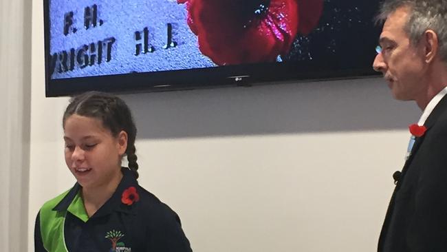 Norfolk Village State School student Eloise Thornber recites poetry on the video which will be screened across aged care centres in Logan on Saturday.