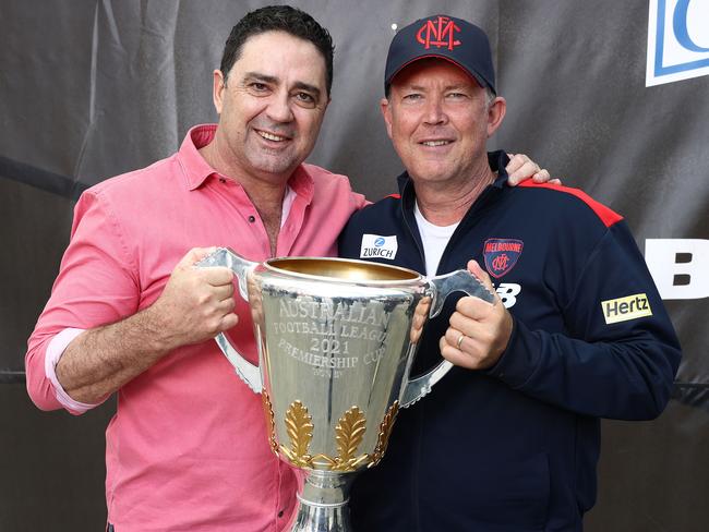 Melbourne legend Garry Lyon and CEO Gary Pert with the premiership cup. Picture: Michael Klein