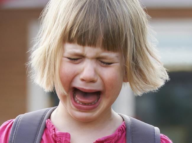 Little Crying Girl Standing Outside Pre School Building