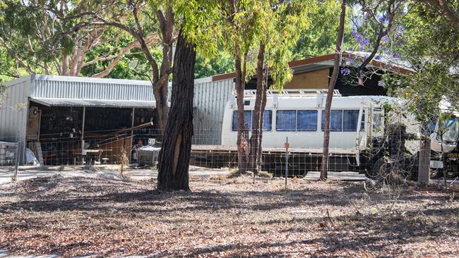 The property is scattered with a collection of buildings along with old motorhomes and caravans. Picture: Brian Cassey