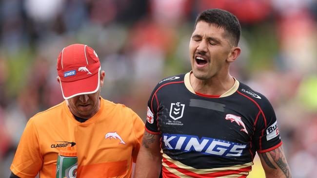 SYDNEY, AUSTRALIA - JUNE 30: Jeremy Marshall-King of the Dolphins is assisted from the field after sustaining a injury during the round 17 NRL match between St George Illawarra Dragons and Dolphins at Netstrata Jubilee Stadium on June 30, 2024 in Sydney, Australia. (Photo by Jason McCawley/Getty Images)