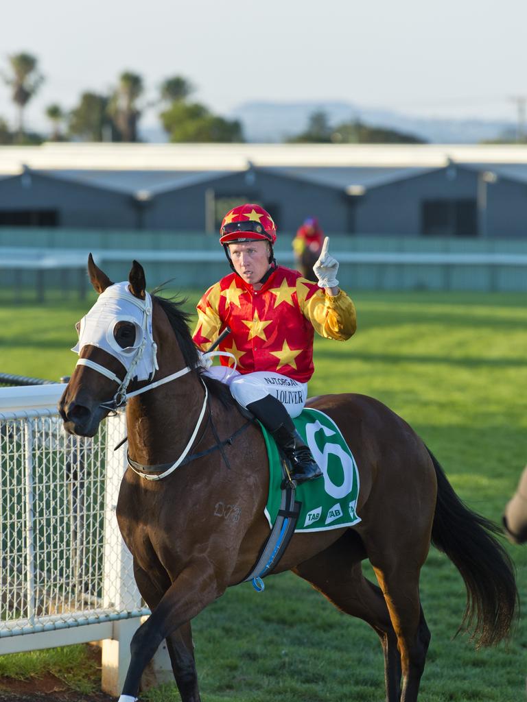 Josh Oliver returns with Tough Times to the winners stall after race two at Clifford Park, Saturday, December 14, 2019. Picture: Kevin Farmer