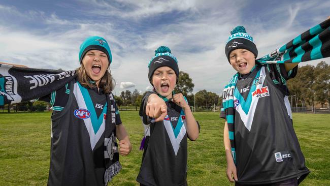 Westport Primary School Power Fans Asher, Brody, and Harlo are ready for finals. Picture: Ben Clark