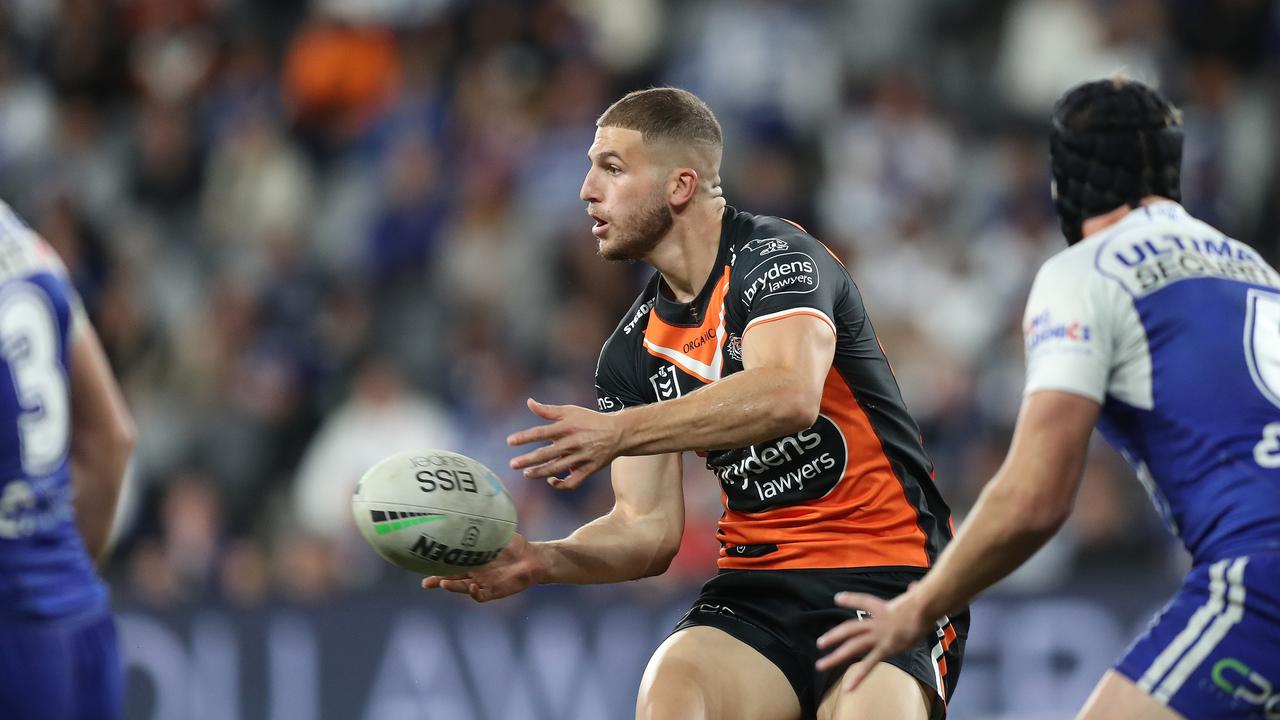 The return of Adam Doueihi has given the Tigers a selection headache, and he is unhappy to not be starting in the halves. Picture: NRL Photos.