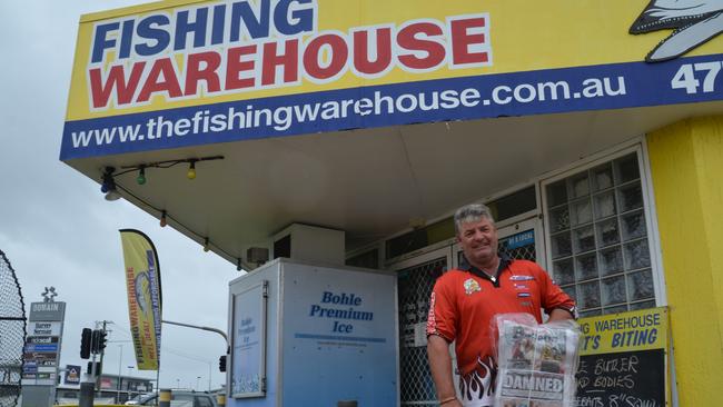 Dave Hodge from Fishing Warehouse says people are still visiting the shop to throw a line in to take the stress off. Photo: Chris Lees