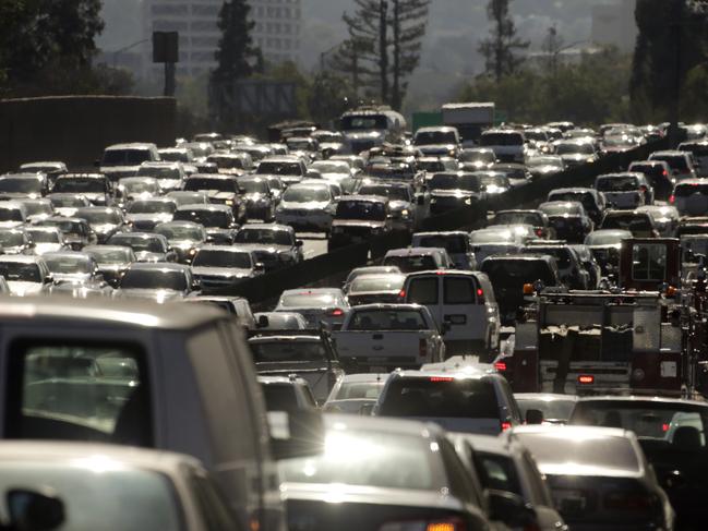 In this Wednesday, May 20, 2015 photo, traffic slowly moves along the 101 Freeway during afternoon rush hour in Los Angeles. Traffic congestion is projected to become significantly worse and more widespread without big changes in how people and products get around. The possible solutions are many, but none is easy or cheap. (AP Photo/Jae C. Hong)