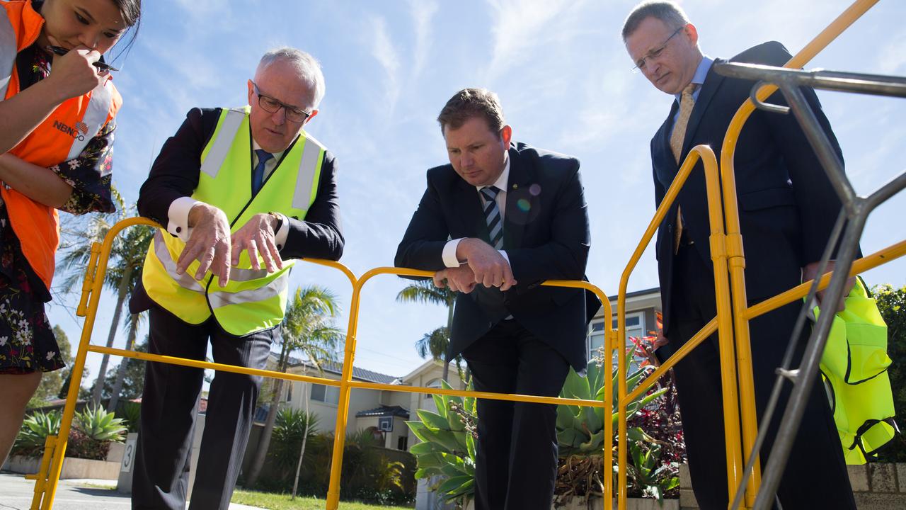 Then Communications Minister Malcolm Turnbull, now retired Liberal MP Craig Laundy and current Communications Minister Paul Fletcher checking progress on the NBN in Homebush.