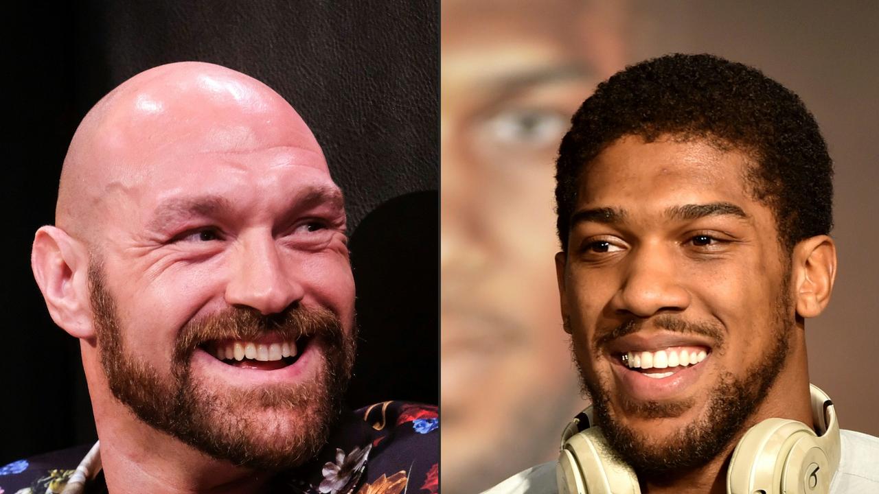 Tyson Fury (L) has offered to train rival Anthony Joshua for a likely upcoming rematch.