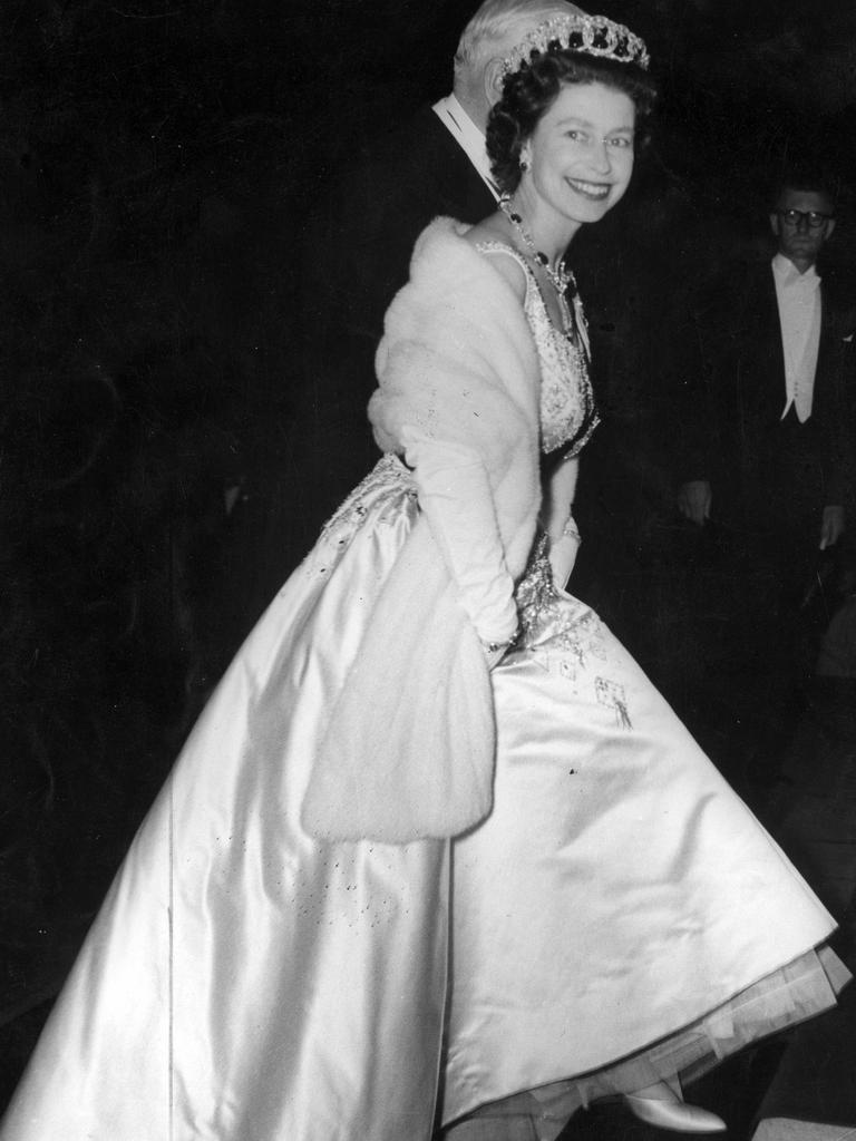 Queen Elizabeth II in a ball gown.