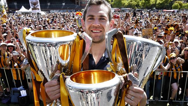 Luke Hodge shows off Hawthorn’s premiership three-peat. Picture: Michael Klein