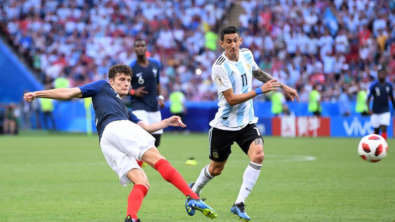 Benjamin Pavard of France shoots and scores