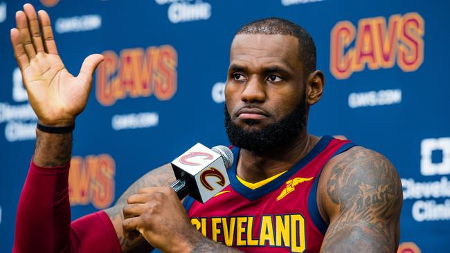 LeBron James #23 of the Cleveland Cavaliers talks to the media.