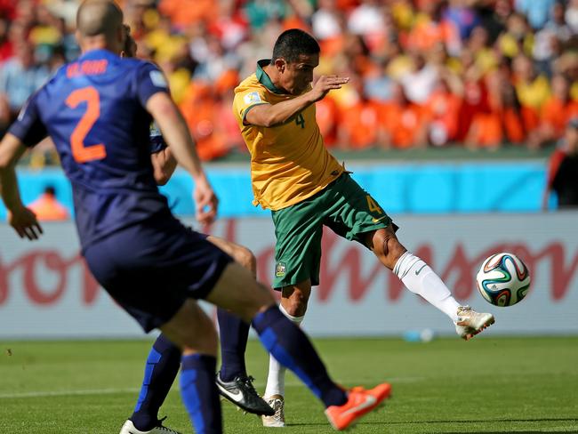 Tim Cahill belts home his cracking volley against Holland at the 2014 World Cup in Brazil. Picture: Getty Images