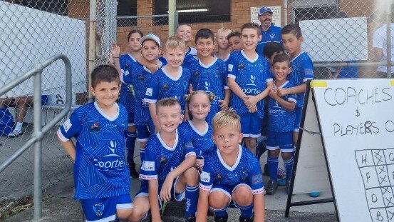 Some of the players of Moorebank Soccer Club, who could benefit from a $50 million sporting super centre.