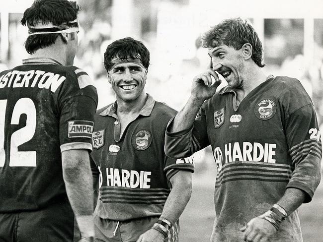 Shane Flanagan (centre) shares a laugh with Brett Kenny.