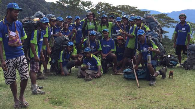 Members of the Buna Cowboys Nines side trek the Kokoda Trail with Getaway Trekking &amp; Adventures. Photo: Alan Kenny.