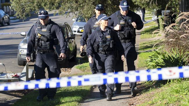 Public Order and Riot Squad officers at the scene on Saturday. Picture: Jeremy Piper