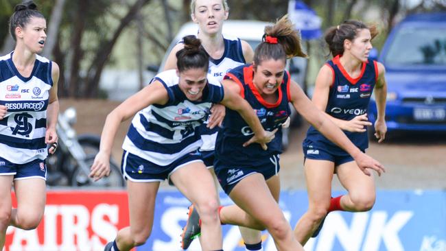 South Adelaide’s Cheyenne Hammond and Norwood's Jessica Macolino hunt the ball in the Panthers win on Saturday. Picture: AAP/Brenton Edwards