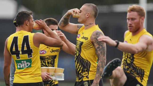 Richmond’s Dustin Martin drinks up during a training session at Punt Road Oval