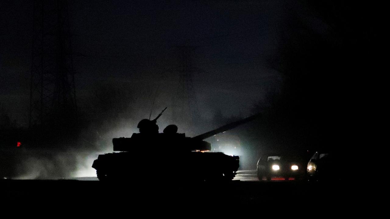 A tank drives along a street after Russian President Vladimir Putin ordered the deployment of Russian troops to two breakaway regions in eastern Ukraine. Picture: REUTERS/Alexander Ermochenko