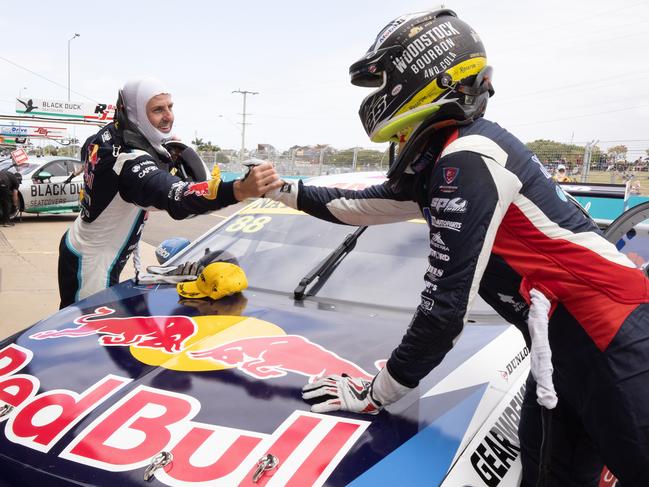 Jamie Whincup celebrates with teammate Shane van Gisbergen after winning race 20 during the Townsville SuperSprint round of the 2020 Supercars Championship. (Photo: Mark Horsburgh/Edge Photographics)