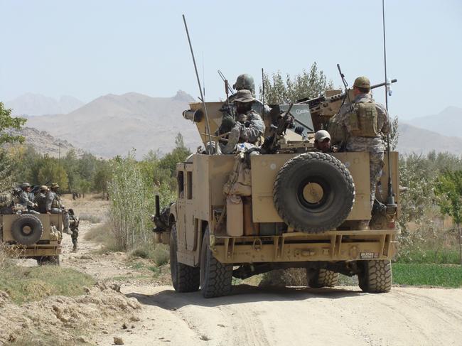 Australian SAS troops and US Army special-forces soldiers head into the Khas Oruzgan Valley prior to the battle. Picture: Supplied. Story: Ian McPhedran