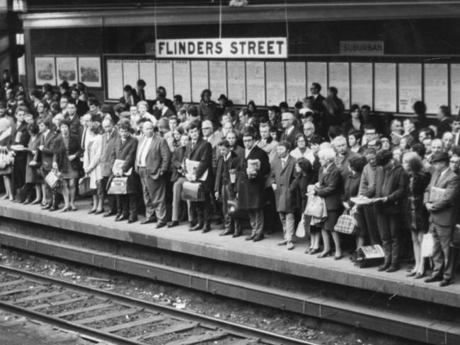 Overcrowding on Melbourne trains is not a new thing. Commuters pictured here gather on the platform at Flinders Street.