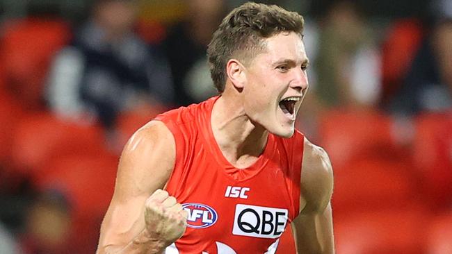 GOLD COAST, AUSTRALIA - SEPTEMBER 08: Hayden McLean of the Swans celebrates kicking a goal during the round 16 AFL match between the Carlton Blues and the Sydney Swans at Metricon Stadium on September 08, 2020 in Gold Coast, Australia. (Photo by Chris Hyde/Getty Images)