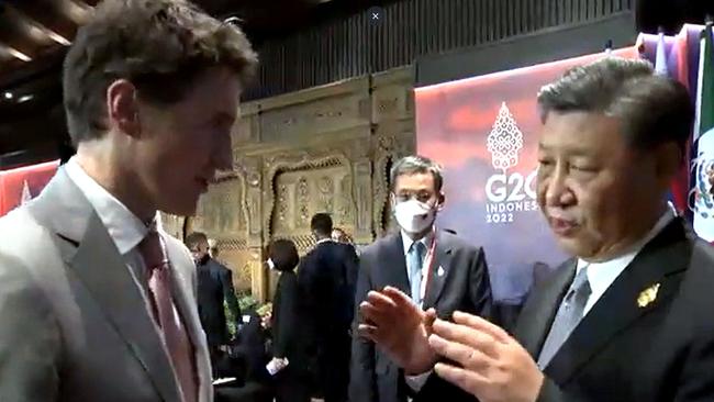 Pool cameras captured this tough exchange between Canadian PM Justin Trudeau (left) and Chinese President Xi Jinping. Picture: Twitter @AnnieClaireBO