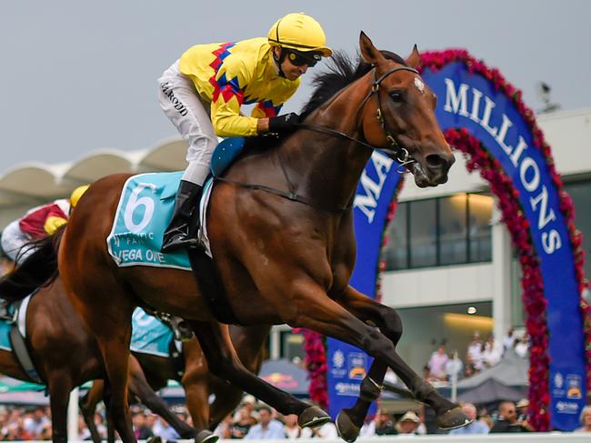 Jockey Michael Rodd rides Vega One to victory in race 8, the Magic Millions Cup, during Magic Millions Race Day at Aquis Park on the Gold Coast, Saturday, January 11, 2020. (AAP Image/Albert Perez) NO ARCHIVING, EDITORIAL USE ONLY