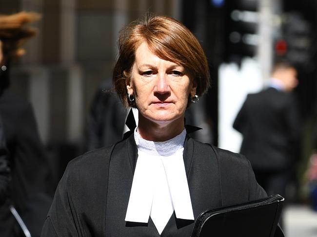 Director of Public Prosecutions Kerri Judd QC (centre) arrives at the Supreme Court of Victoria ahead of James "Dimitrious" Gargasoulas' trial, Melbourne, Thursday, November 8, 2018. Gargasoulas, the accused Bourke Street murderer is facing charges on six counts of murder and 28 charges of attempted murder. (AAP Image/James Ross) NO ARCHIVING