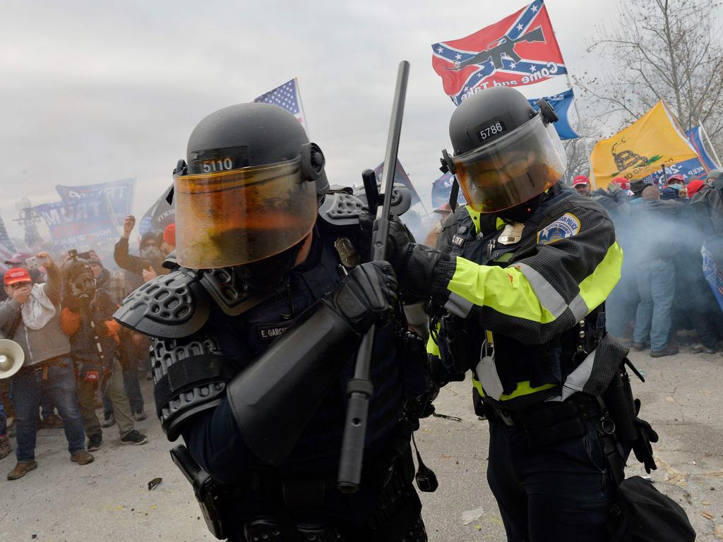 Trump supporters clash with police and security forces as they try to storm the US Capitol in Washington. Picture: Joseph Prezioso / AFP