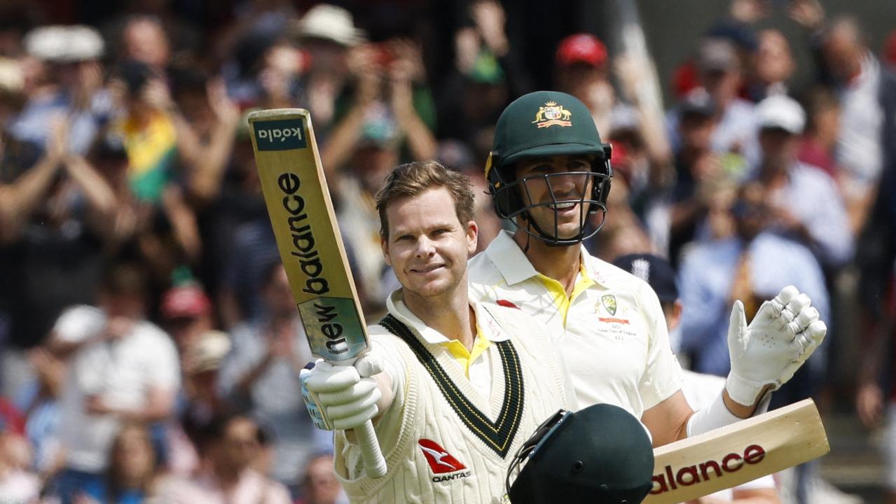 Australia's Steve Smith (L) celebrates his century with Pat Cummins. Picture: AFP