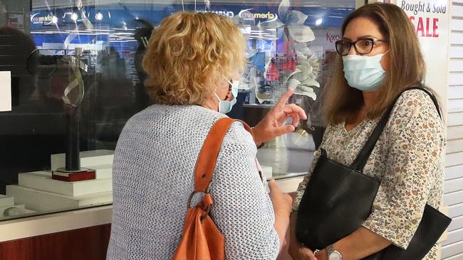 Margaretha Dudok and Monica Griffiths outside of Inca Gold Jewellers at Helensvale discuss how they are trying to get their jewellery returned now the business has closed. Picture Glenn Hampson