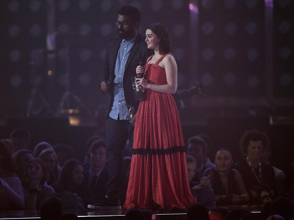 Romesh Ranganathan and Maisie Williams present the award for Best British Group on stage at The BRIT Awards 2017 at The O2 Arena on February 22, 2017 in London, England. Picture: Getty