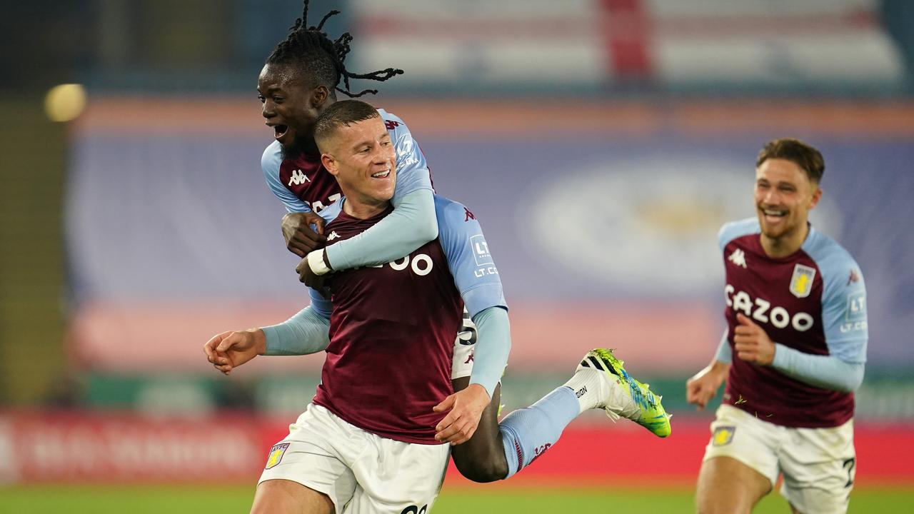 Ross Barkley of Aston Villa celebrates with teammates Bertrand Traore and Matty Cash after scoring his team's winning goal. (Photo by Jon Super - Pool/Getty Images)