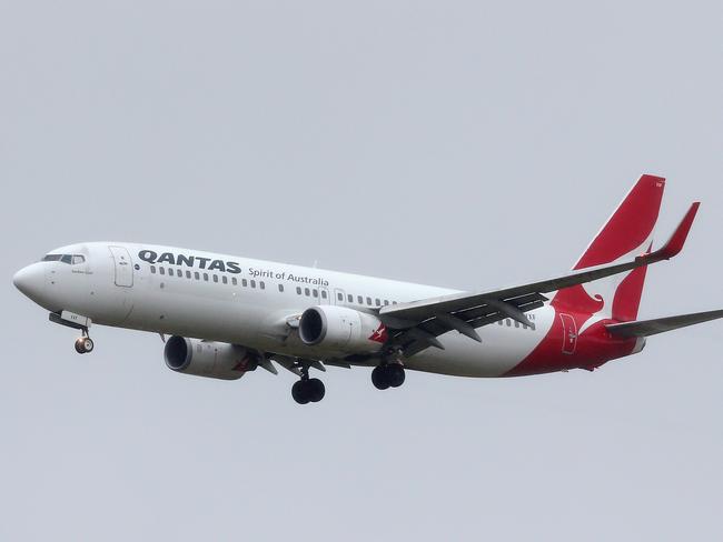 A Qantas plane heads in to land at Melbourne Airport. Picture: Mark Stewart