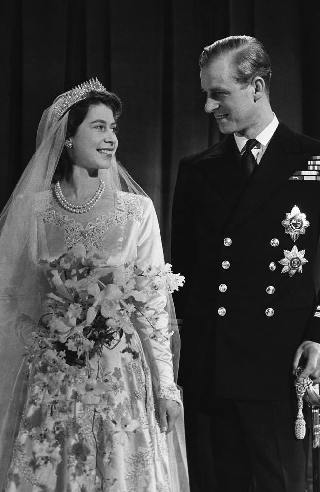 The happy couple on their wedding day, which brought joy to the public in post-war Britain. Picture: Getty